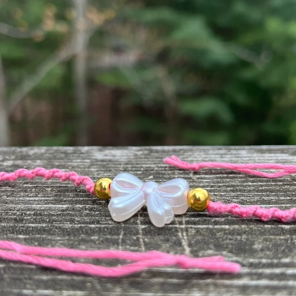 Handmade pink & Gold Bow Coquette inspired spiral dainty bracelet